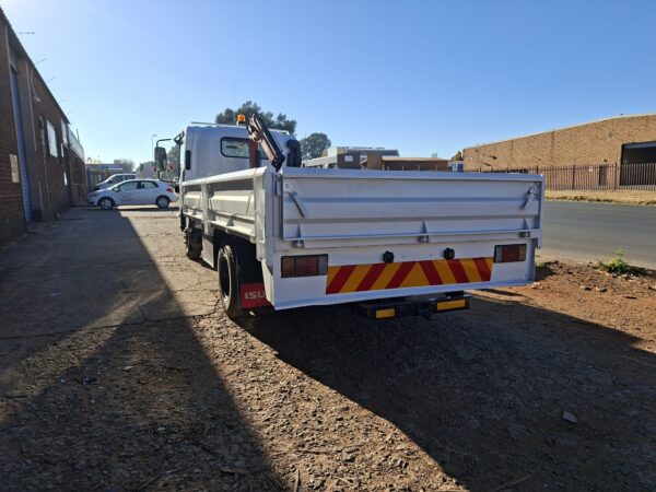 2010 Isuzu NPR400 dropside 4x2 with Palfinger PC2300A crane