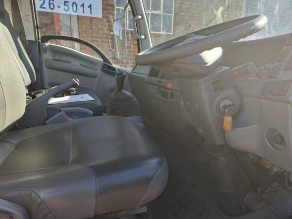 2010 Isuzu NPR400 dropside 4x2 with Palfinger PC2300A crane Front seating area