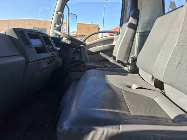 2010 Isuzu NPR400 dropside 4x2 with Palfinger PC2300A crane seating