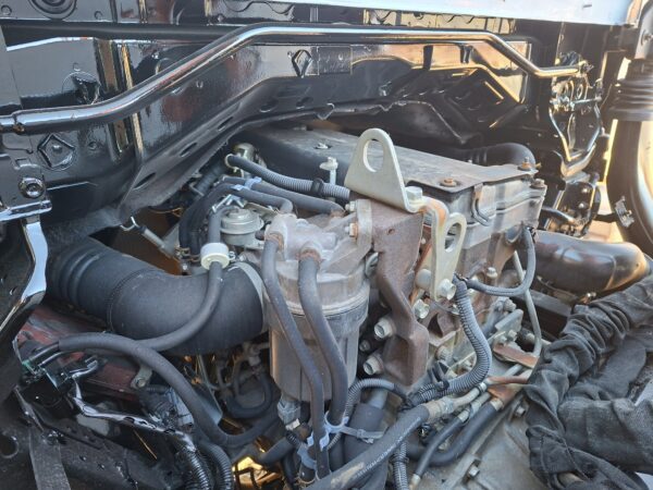 2010 Isuzu NPR400 dropside 4x2 with Palfinger PC2300A crane Engine