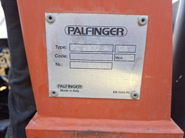 2010 Isuzu NPR400 dropside 4x2 with Palfinger PC2300A crane plaque